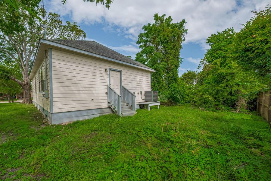 Expansive backyard offering endless possibilities for customization and enjoyment. Expansive backyard offering endless possibilities for customization and enjoyment.