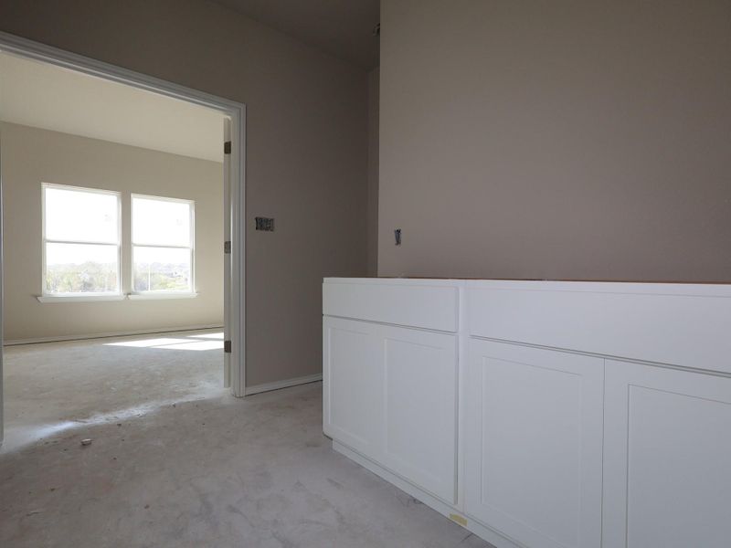 In-progress construction of a new home in Carillon, Manor, TX (Image 20).