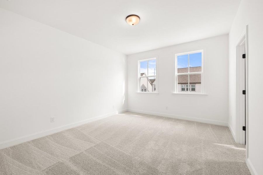 Spacious, unfurnished interior of a new home in East Harbor II at Chestatee, Dawsonville (Image 57).