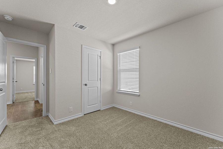 Spacious, unfurnished interior of a new home in Brookstone Creek, San Antonio (Image 12).