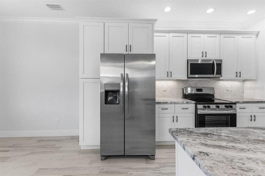 Furnished interior view inside a new home in , Englewood (Image 11).