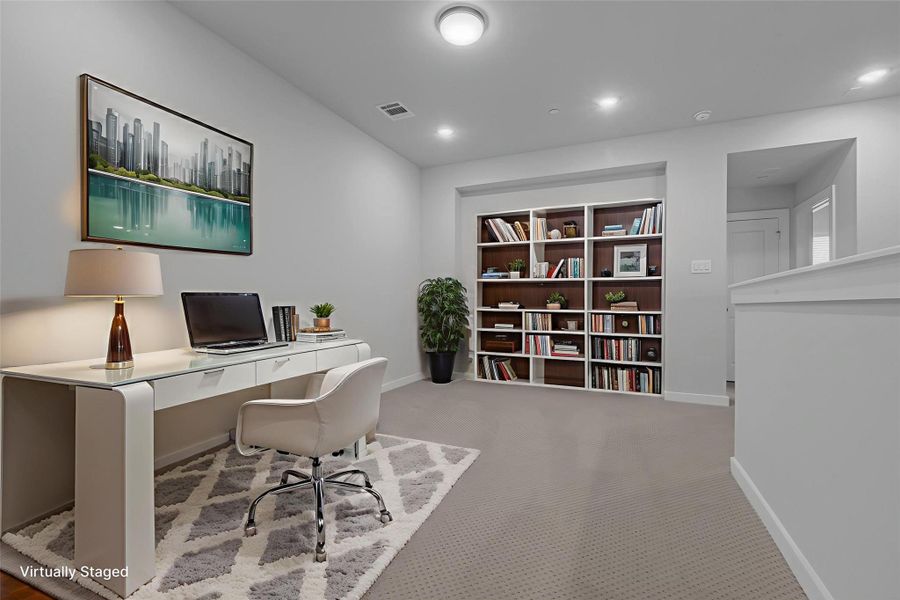Upstairs loft staged as an office.
