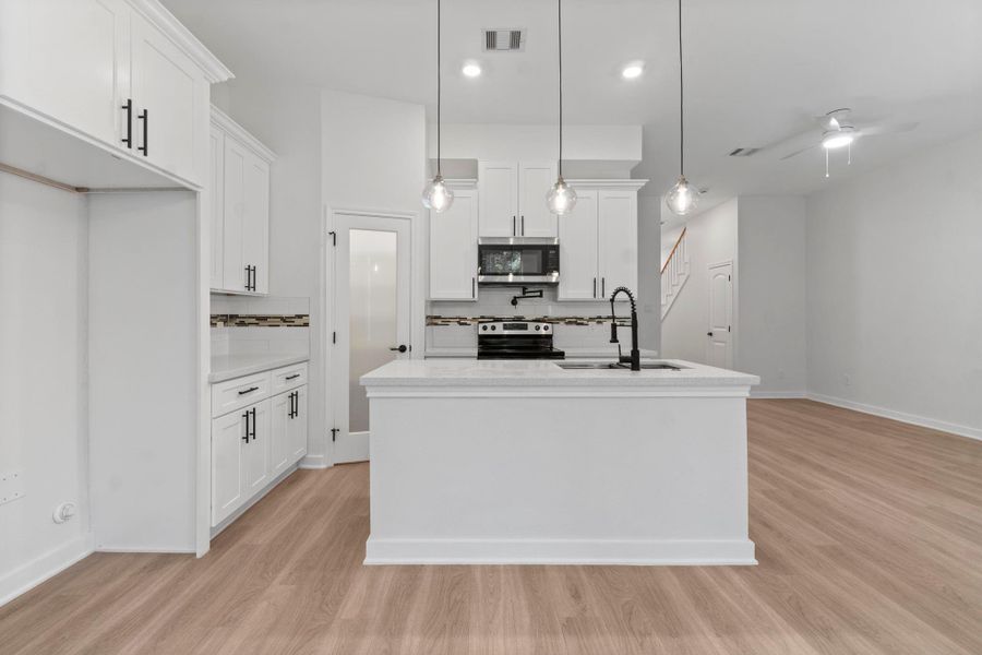 Furnished interior view inside a new home in , Conroe (Image 10).