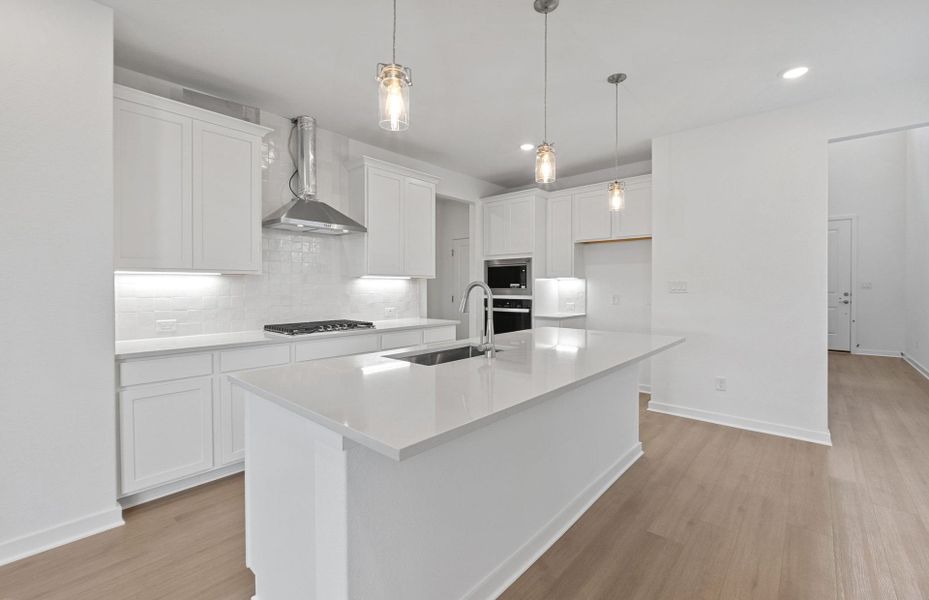 Furnished interior view inside a new home in Wolf Ranch, Georgetown (Image 5).