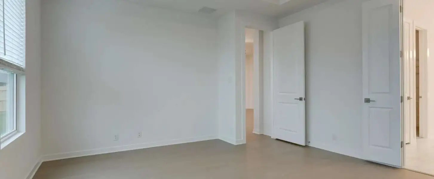 Representative unfurnished interior of a home built from the Blanco by Ashton Woods in Saddlebrook Ranch, Schertz (Image 14).