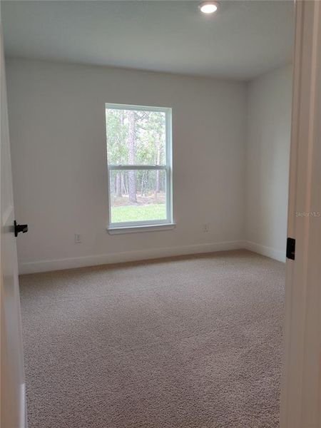 Spacious, unfurnished interior of a new home in Royal Highlands, Weeki Wachee (Image 16).