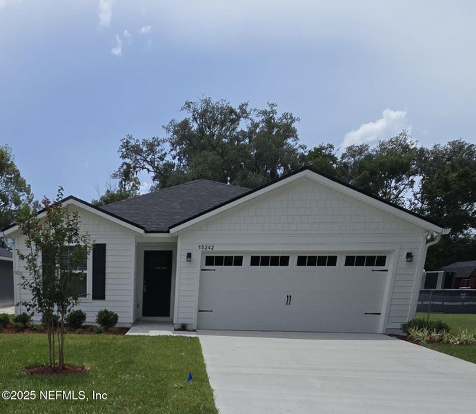 Front exterior of a new home in , Jacksonville, FL, highlighting curb appeal (Image 1). Front exterior of a new home in , Jacksonville, FL, highlighting curb appeal (Image 1).