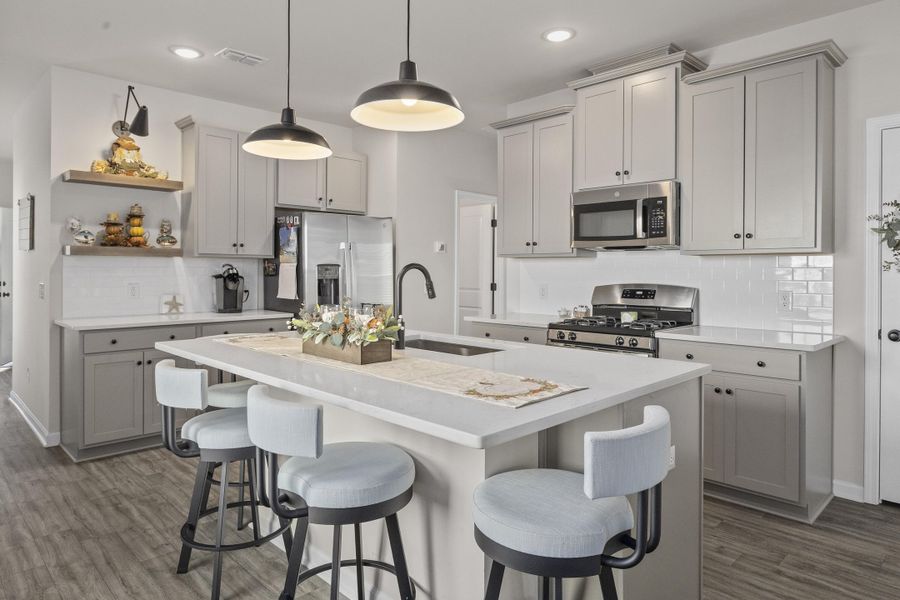 Furnished interior view inside a new home in K. Hovnanian's® Four Seasons at Lakes of Cane Bay, Summerville (Image 8). Furnished interior view inside a new home in K. Hovnanian's® Four Seasons at Lakes of Cane Bay, Summerville (Image 8).