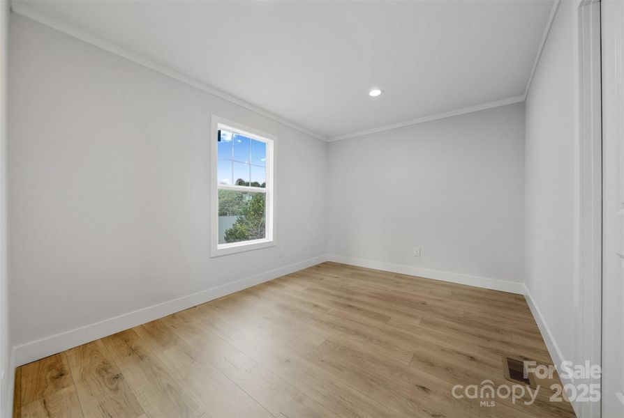 Spacious, unfurnished interior of a new home in , Lenoir (Image 19).