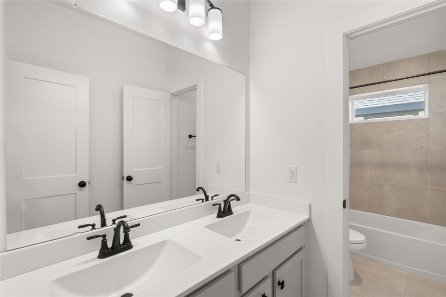 Furnished interior view inside a new home in The Woodlands Hills, Willis (Image 5).