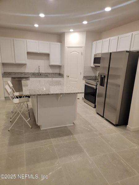 Furnished interior view inside a new home in , Jacksonville (Image 6).