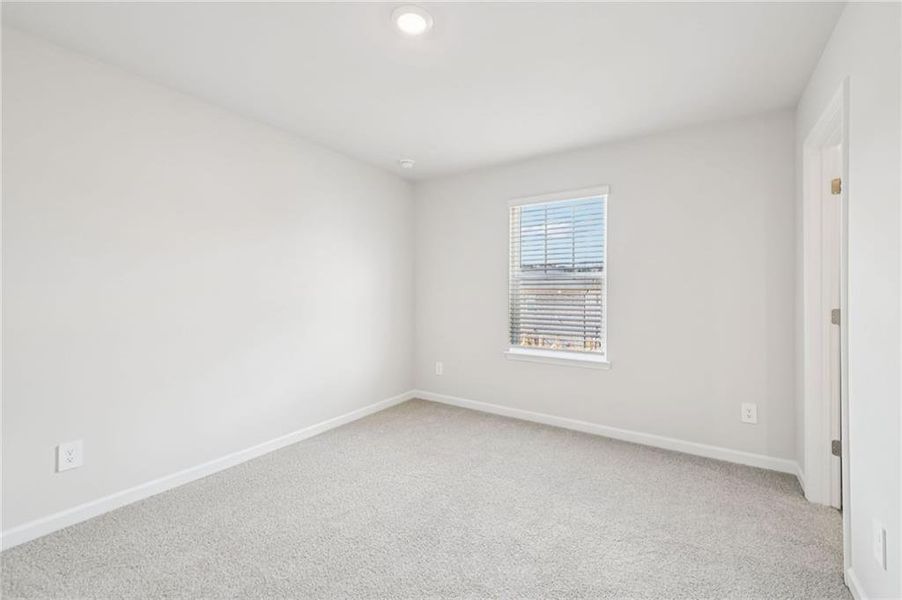 Spacious, unfurnished interior of a new home in Creekside at Oxford Park, Fairburn (Image 46).