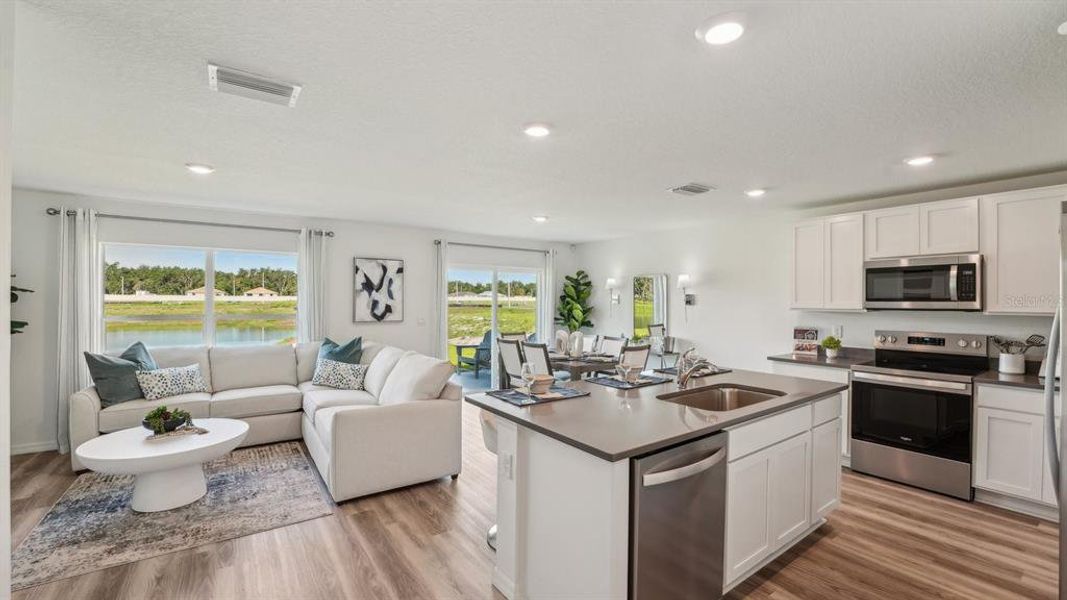 Furnished interior view inside a new home in Triumph South, Wildwood (Image 9).