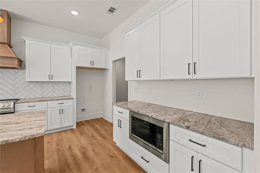 Furnished interior view inside a new home in , Carrollton (Image 13). Furnished interior view inside a new home in , Carrollton (Image 13).