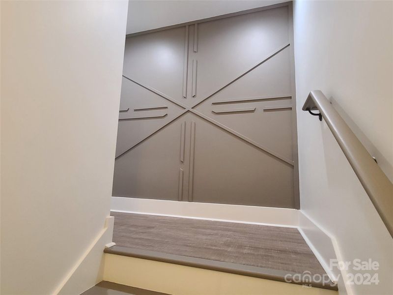 Accent wall on landing to downstairs