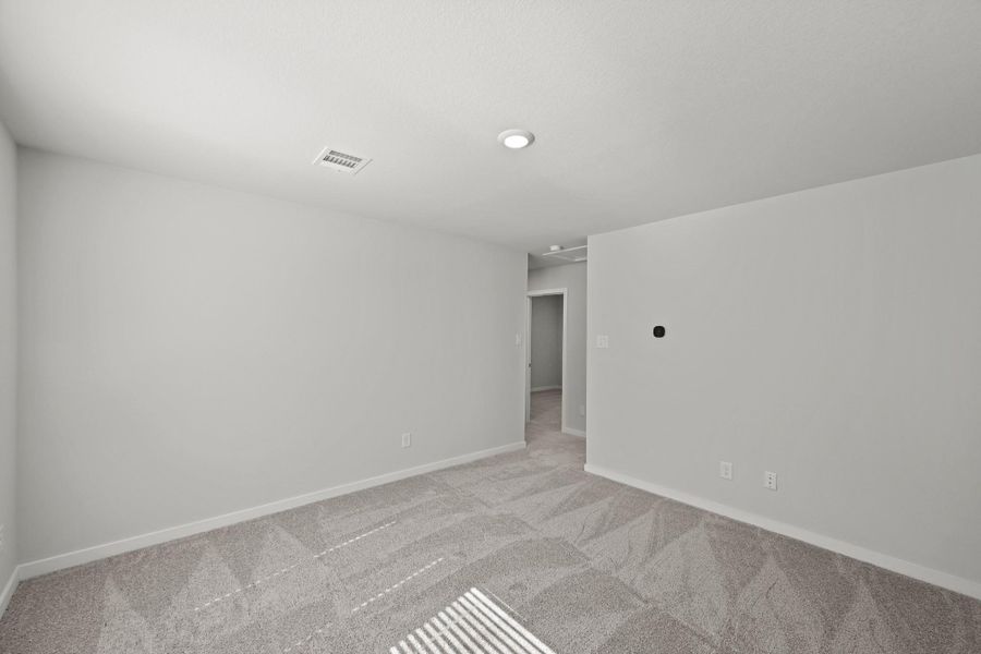 Spacious, unfurnished interior of a new home in Lonestar Collection at Paloma at Sanford Farms, Waller (Image 24).