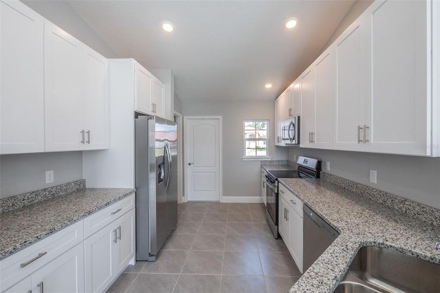 Furnished interior view inside a new home in , Kissimmee (Image 10).