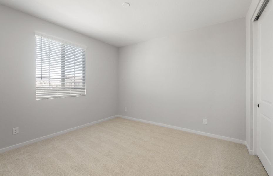 Spacious, unfurnished interior of a new home in Legado West, Queen Creek (Image 24).