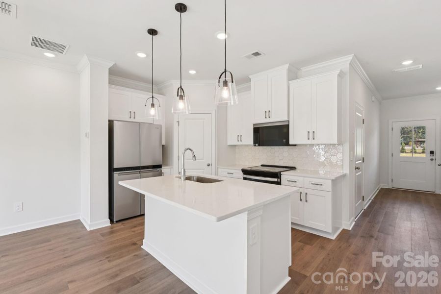 Photo is not of the actual home, but is an inspirational photo of builder’s model home and may depict options, furnishings, and/or decorator features that are not included