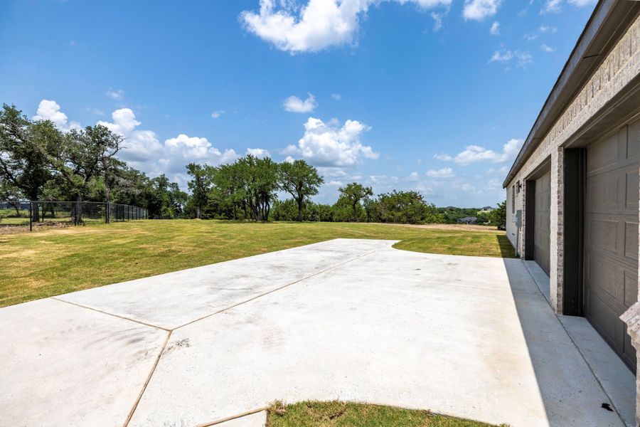 Front exterior of a new home in Vintage Oaks, Weatherford, TX, highlighting curb appeal (Image 24).