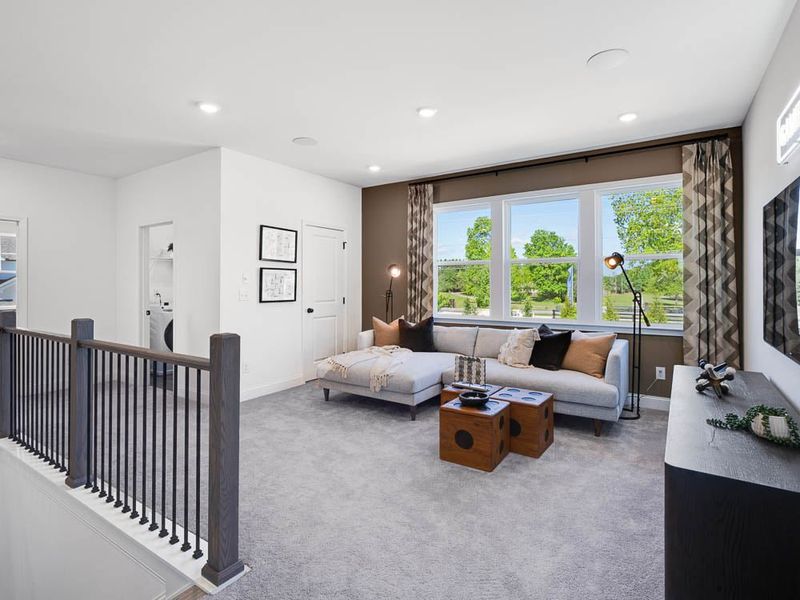 Representative furnished interior of a home built from the Essex by Taylor Morrison in Bailey Fence, Dacula (Image 19).