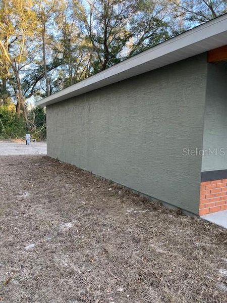 Exterior details and patio area of a home in , Summerfield (Image 17).