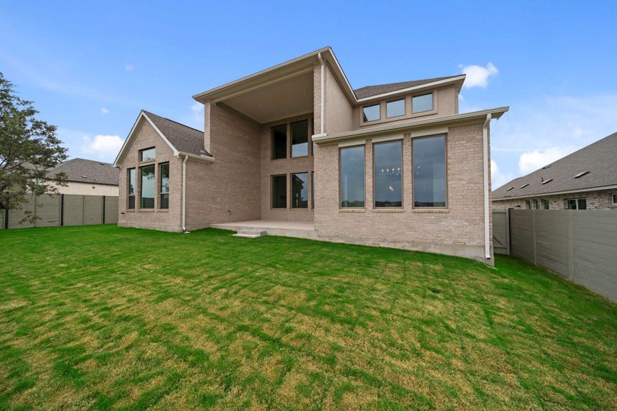 Rear of Home and Private Backyard