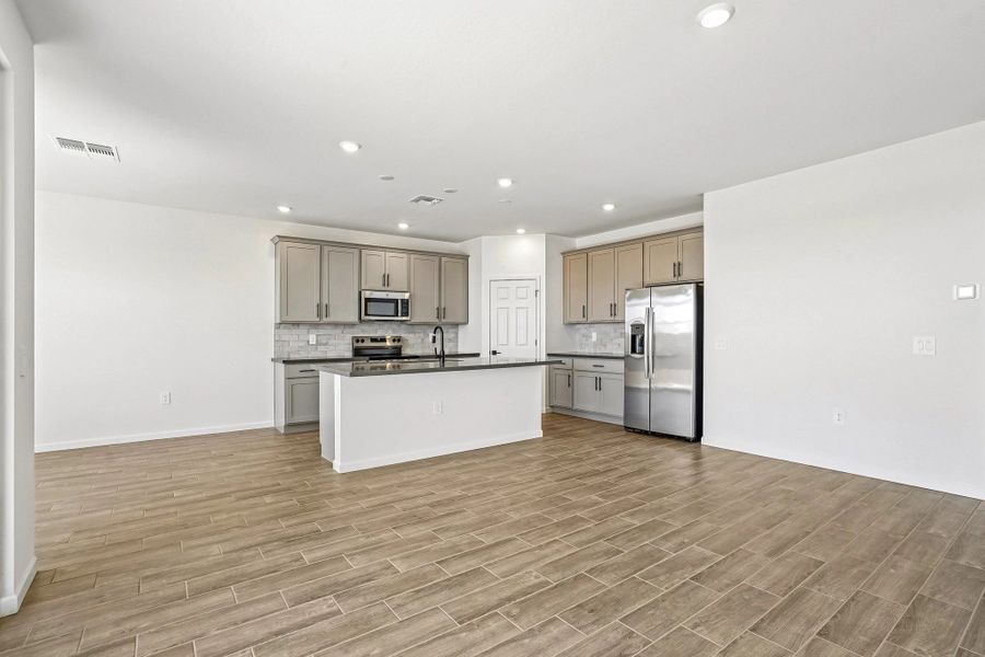 Great room and kitchen Great room and kitchen