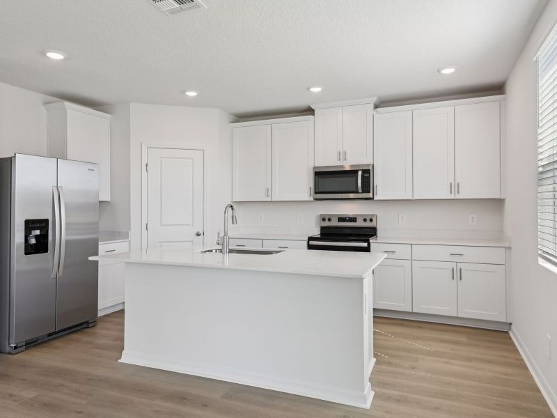 Furnished interior view inside a new home in The Reserve at Twin Lakes, St. Cloud (Image 3).
