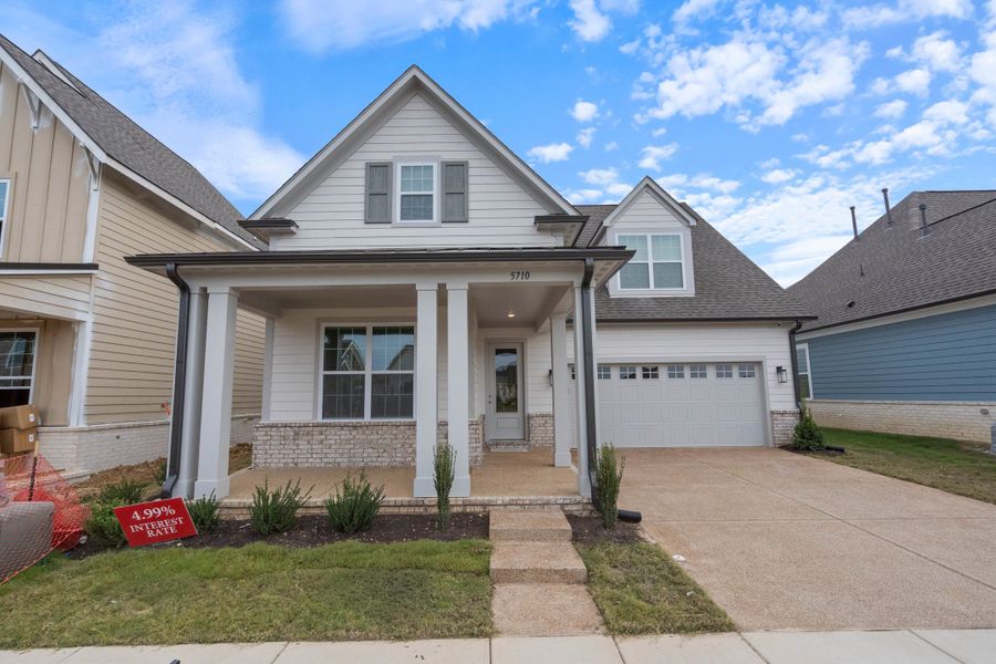 Front exterior of a new home in Myers Park, Arlington, TN, highlighting curb appeal (Image 1).