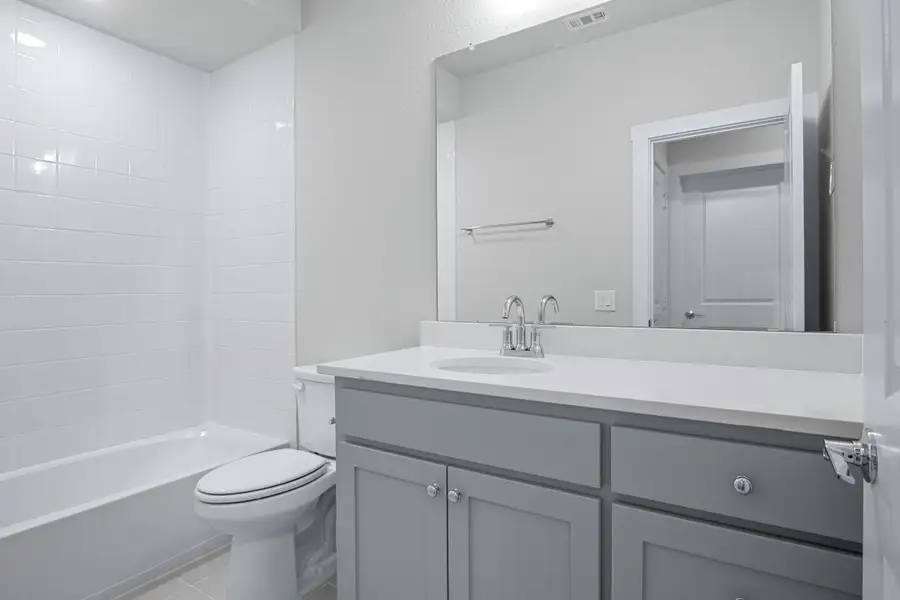 Furnished interior view inside a new home in Willow Grove Townhomes, Melissa (Image 17).
