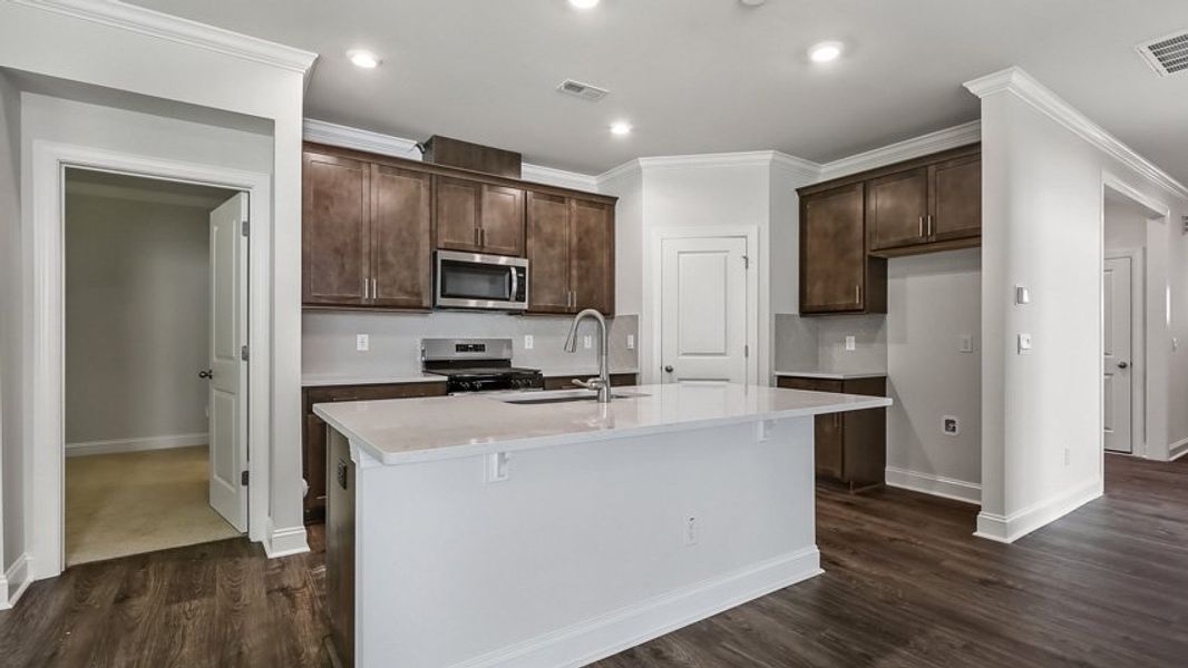 Representative furnished interior of a home built from the Gavin by D.R. Horton in Horton Park, Apex (Image 6).