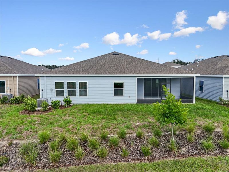 Front exterior of a new home in , Newberry, FL, highlighting curb appeal (Image 25).