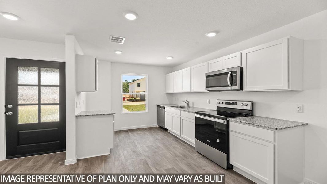 Representative furnished interior of a home built from the Blake by D.R. Horton in Castles Edge, Willis (Image 4).