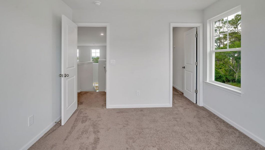 Spacious, unfurnished interior of a new home in Indigo Preserve Townhomes, Leland (Image 19).