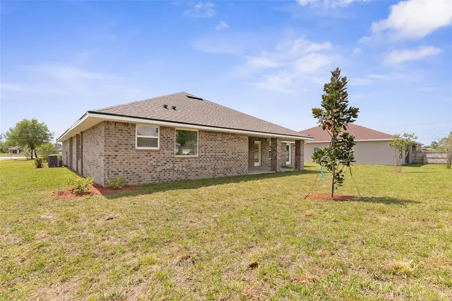 Exterior details and patio area of a home in Palm Coast, Palm Coast (Image 21). Exterior details and patio area of a home in Palm Coast, Palm Coast (Image 21).