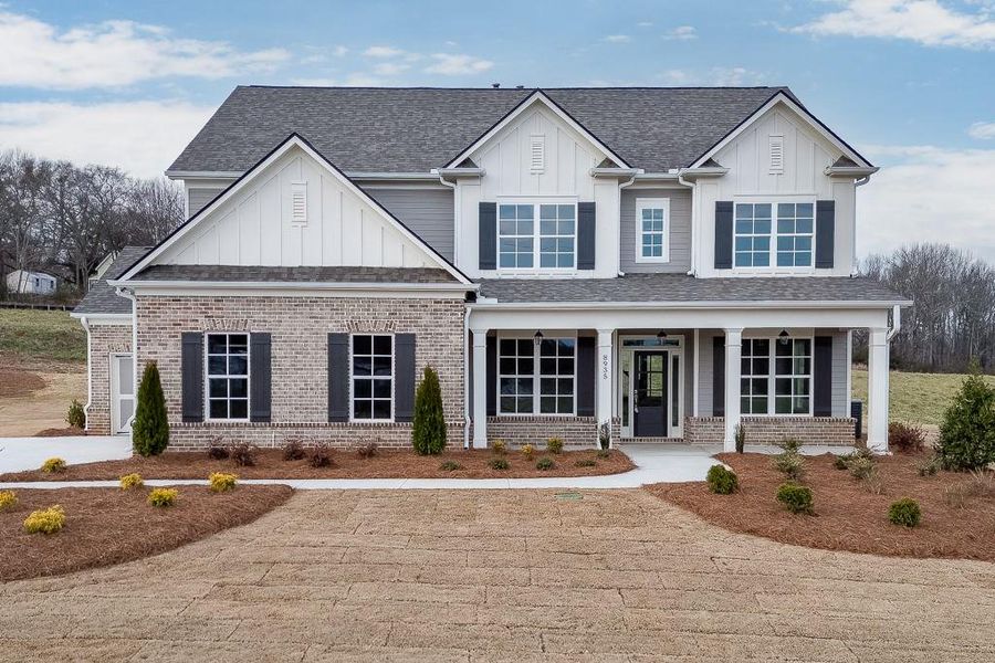 Front exterior of a new home in , Gainesville, GA, highlighting curb appeal (Image 1). Front exterior of a new home in , Gainesville, GA, highlighting curb appeal (Image 1).