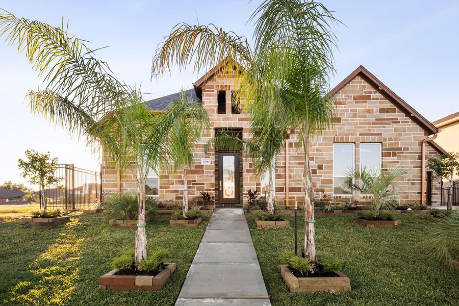 Front exterior of a new home in , Kemah, TX, highlighting curb appeal (Image 23).