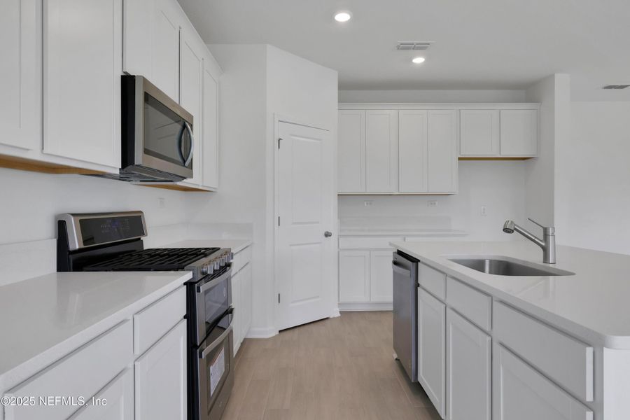 Furnished interior view inside a new home in Cordova Palms, St. Augustine (Image 7).
