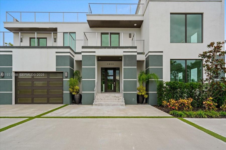 Front exterior of a new home in , Naples, FL, highlighting curb appeal (Image 27).