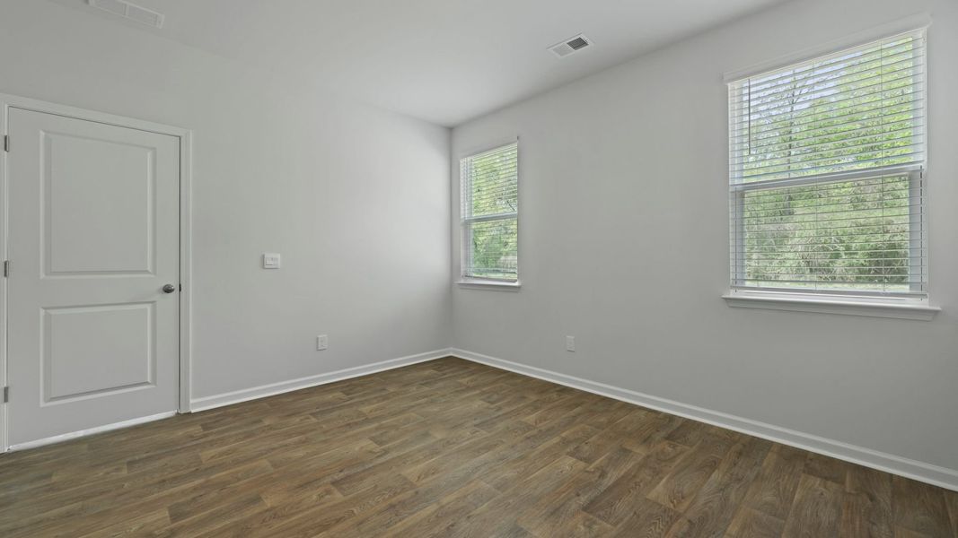 Representative unfurnished interior of a home built from the DOWNING by D.R. Horton in The Oaks at Center Station, Hollywood (Image 11).