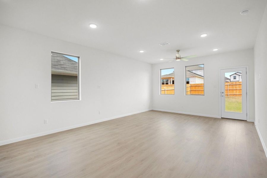 Living Room in the Magnolia home plan by Trophy Signature Homes – REPRESENTATIVE PHOTO