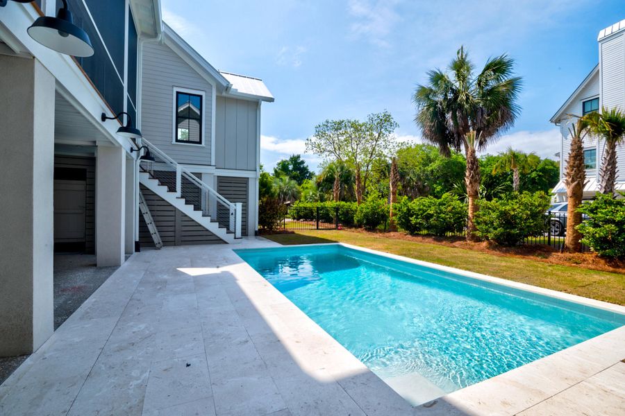 Front exterior of a new home in , Sullivan's Island, SC, highlighting curb appeal (Image 28).