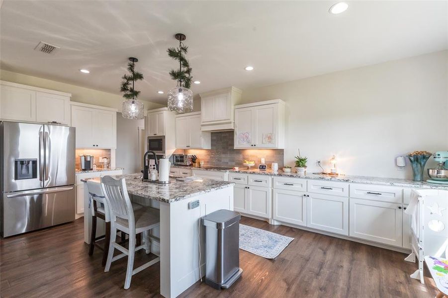 Extended lower cabinets for more storage and more counter tops!