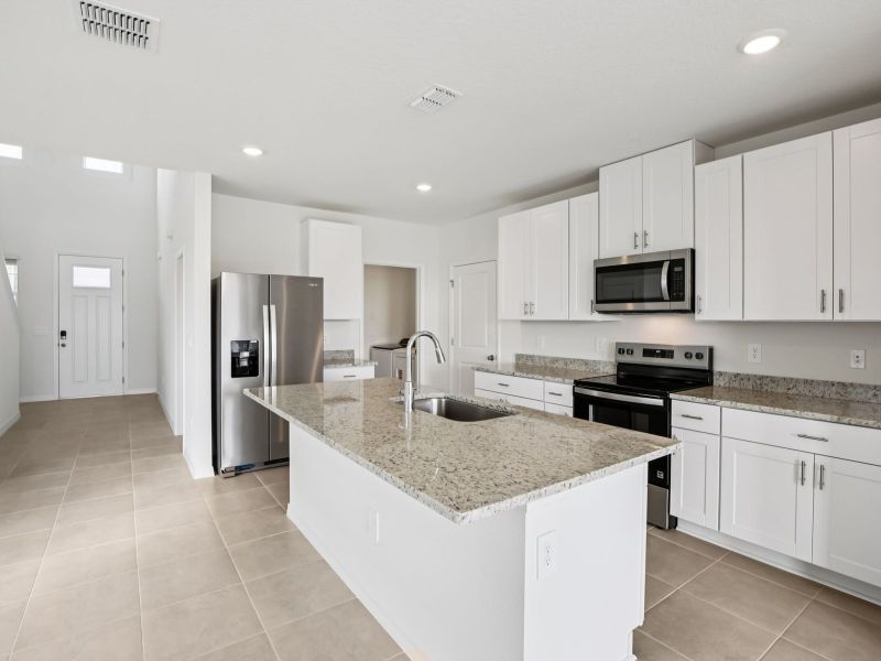Furnished interior view inside a new home in Magnolia Bay - Premier Series, Nokomis (Image 3).