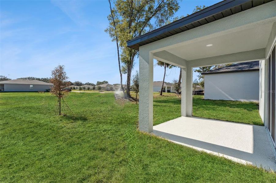 Exterior details and patio area of a home in Estes Reserve, Eustis (Image 4).