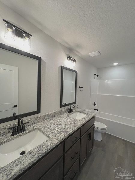 Furnished interior view inside a new home in Pine Top, Cantonment (Image 7).