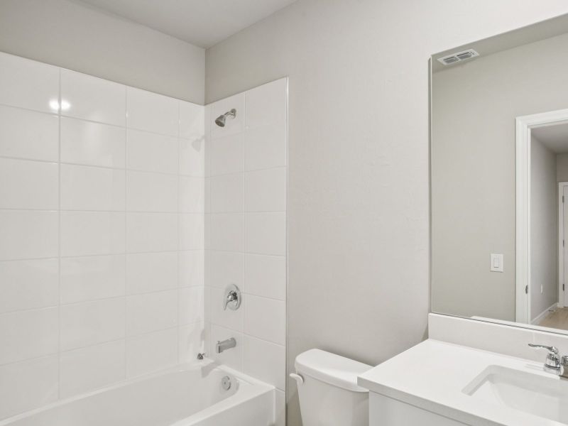 Furnished interior view inside a new home in Crescent Lakes - Premier Series, Punta Gorda (Image 7).