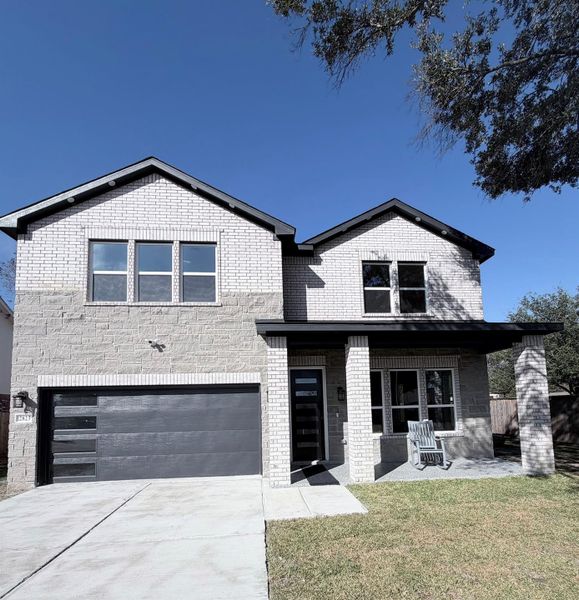 Front exterior of a new home in , Houston, TX, highlighting curb appeal (Image 21).