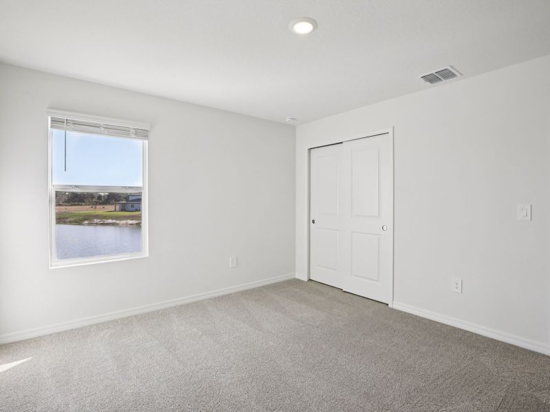 Spacious, unfurnished interior of a new home in Magnolia Bay - Premier Series, Nokomis (Image 15).